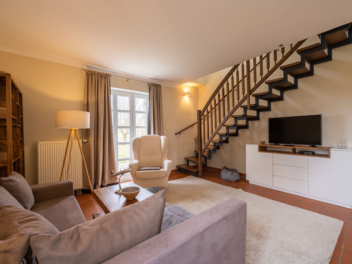 Feriendorf Rugana Komfortplus Ferienwohnung mit 2 Schlafzimmern und Terrasse (D12) Insel Rügen - Wohnzimmer