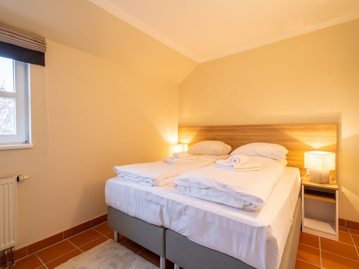 Feriendorf Rugana Komfortplus Ferienwohnung mit 2 Schlafzimmern und Terrasse (D33) Insel Rügen - Schlafzimmer