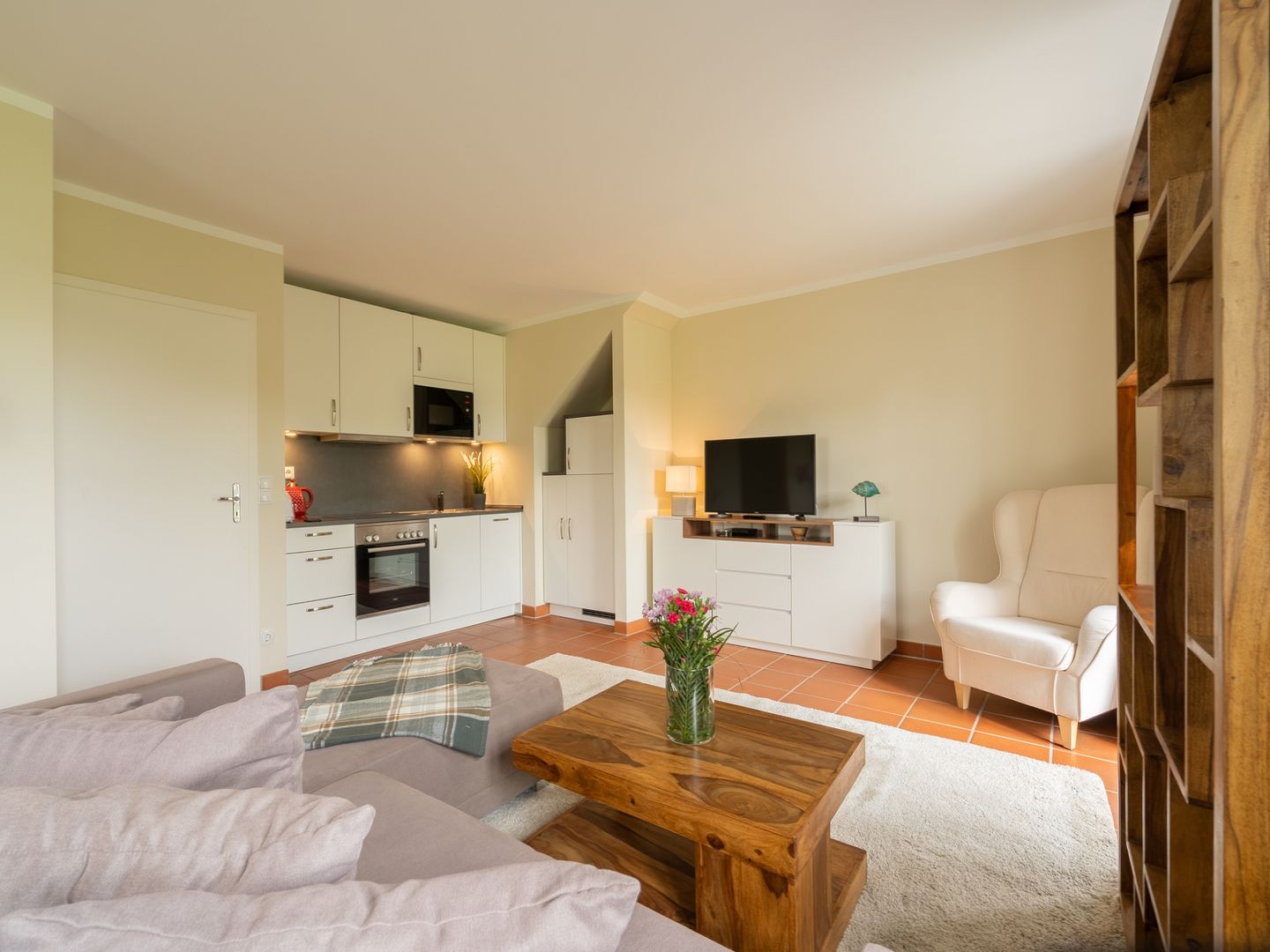 Feriendorf Rugana Komfortplus Ferienwohnung mit 1 Schlafzimmern und Terrasse (D46) Insel Rügen - Wohnzimmer