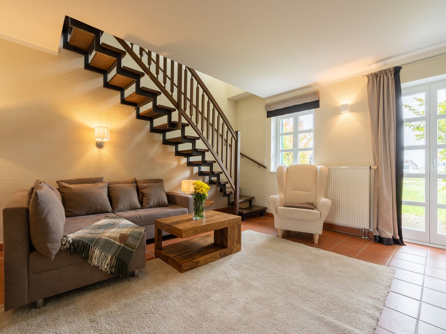 Feriendorf Rugana Komfortplus Ferienwohnung mit 2 Schlafzimmern und Terrasse (D52) Insel Rügen - Wohnzimmer