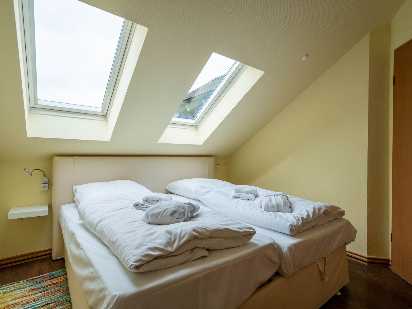 Dünenpark Binz Komfort Ferienwohnung mit 1 Schlafzimmer und Balkon im Dachgeschoss (207) Insel Rügen - Schlafzimmer