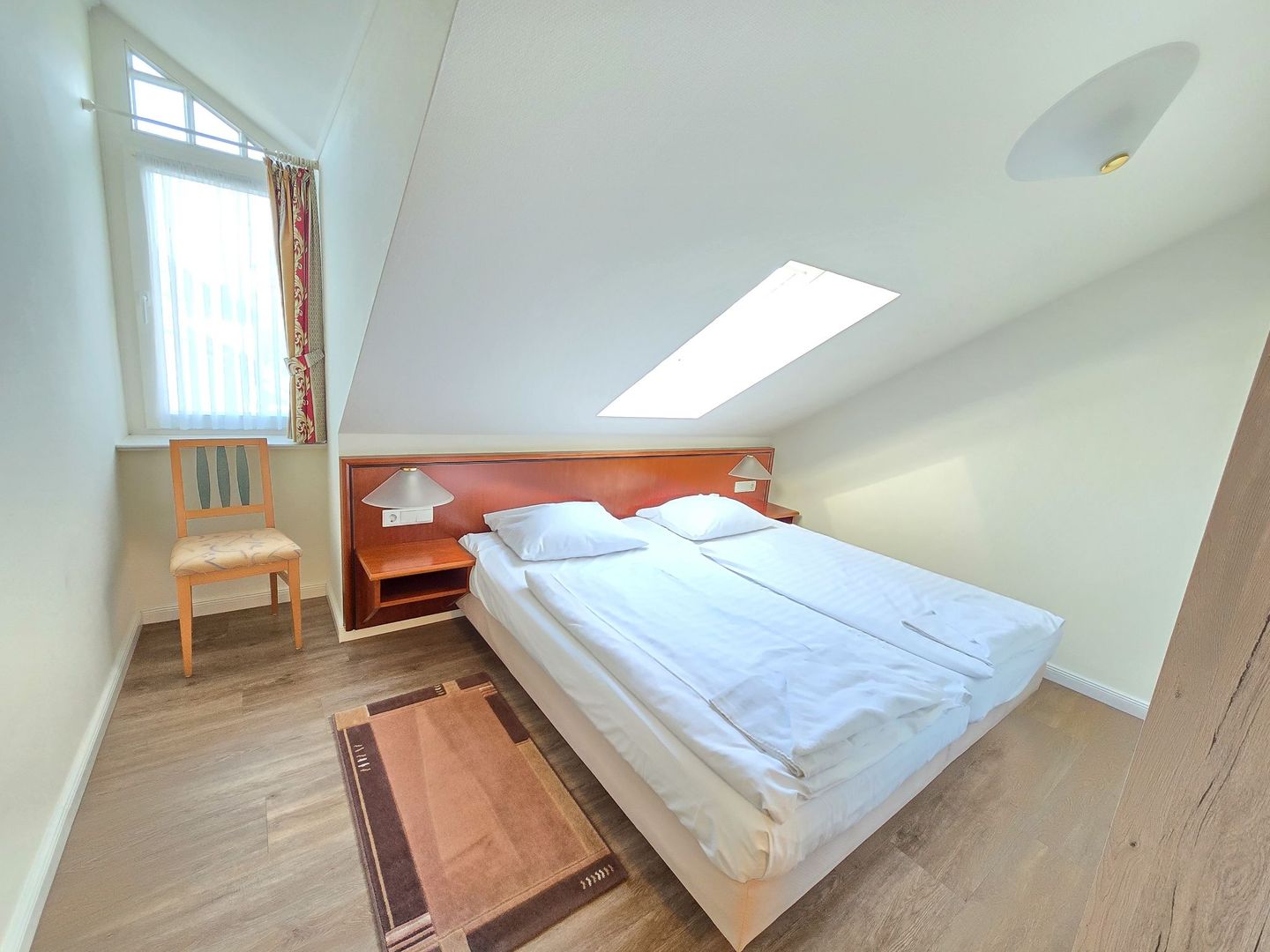 Dünenpark Binz Komfort Ferienwohnung mit 2 Schlafzimmern und Balkon im Dachgeschoss (218) Insel Rügen - Schlafzimmer