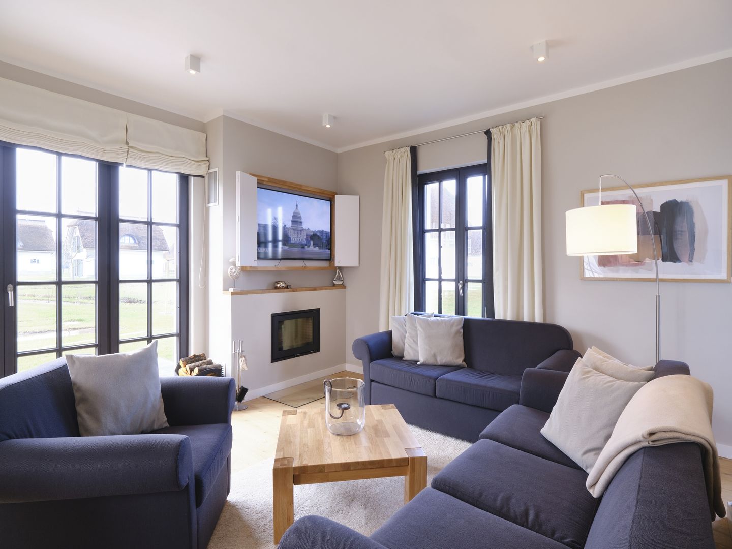 Luxus Reetdachvilla mit 3 Schlafzimmern, Sauna und Kamin (G05) - Wohnzimmer