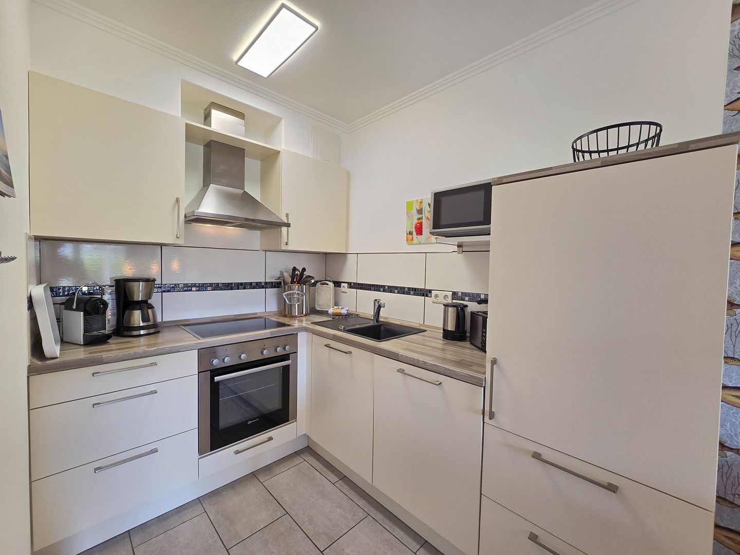 Dünenpark Binz Komfortplus Ferienwohnung mit 1 Schlafzimmer und Terrasse im Erdgeschoss (212) Insel Rügen - Küche / Küchenzeile