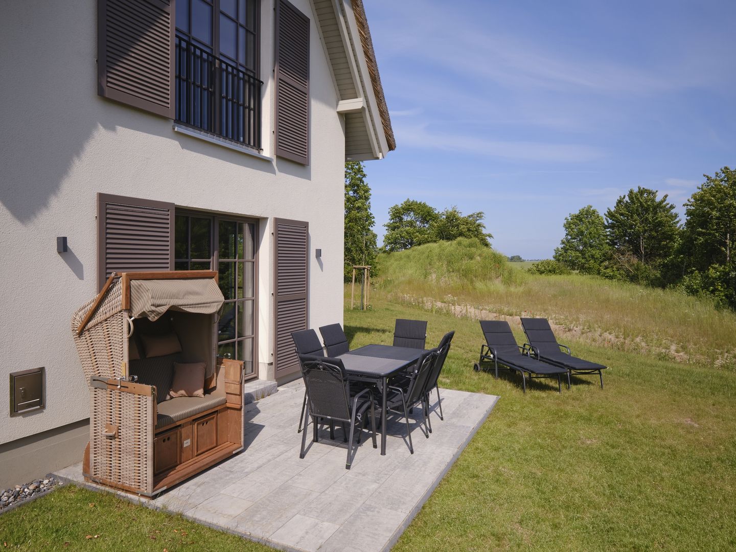 Premium Reetdachvilla mit 3 Schlafzimmern, Sauna und Kamin (H08) - Terrasse