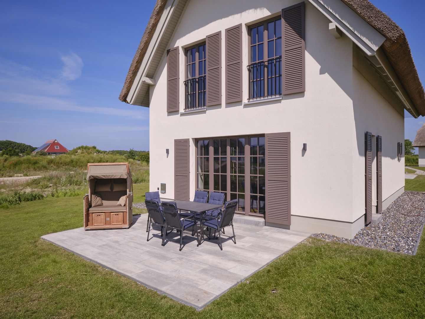 Luxus Reetdachvilla mit 3 Schlafzimmern, Sauna und Kamin (H18) - Terrasse