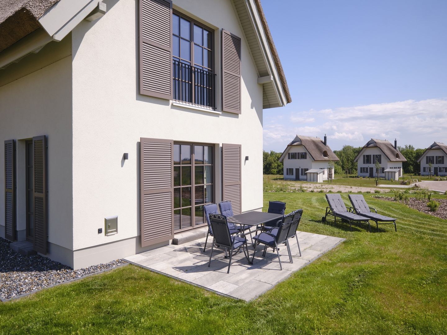 Premium Reetdachvilla mit 3 Schlafzimmern, Sauna und Kamin (H21) - Terrasse