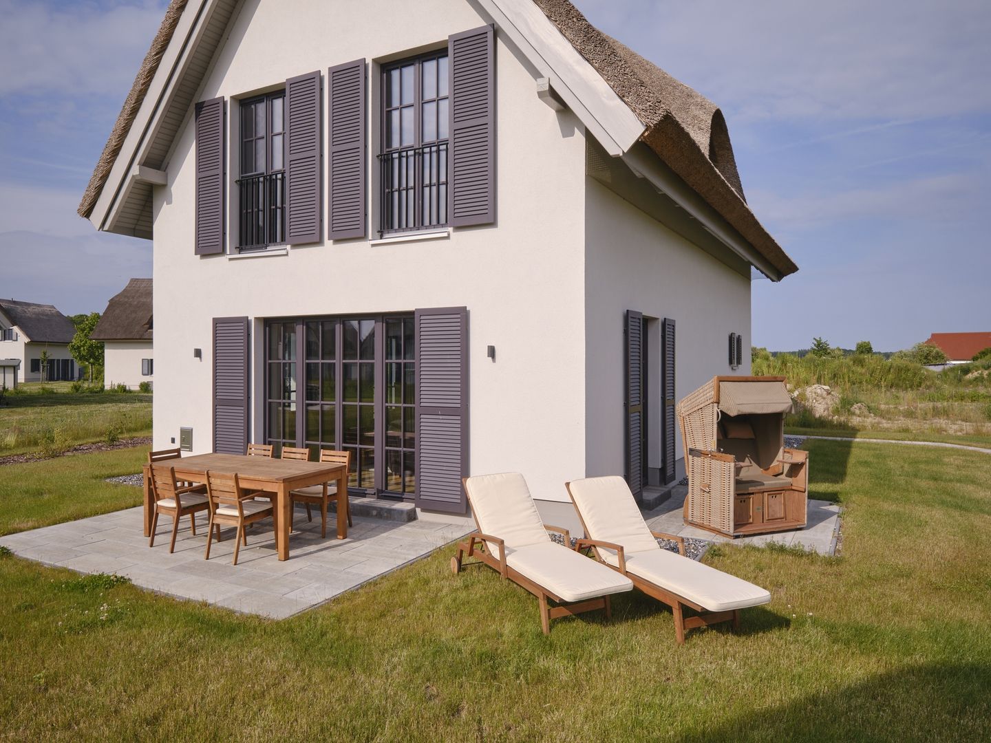 Luxus Reetdachvilla mit 3 Schlafzimmern, Sauna und Kamin (G05) - Terrasse