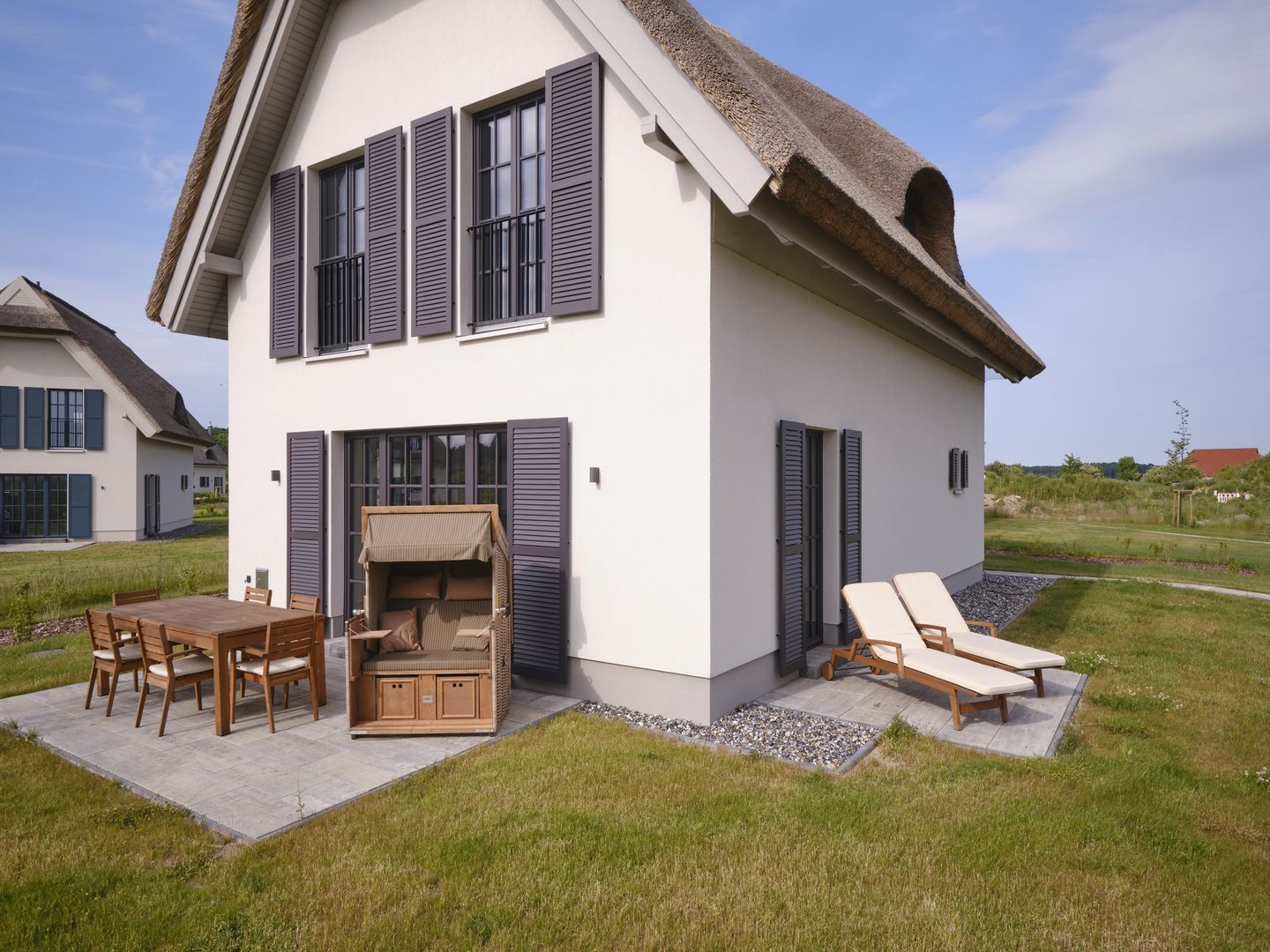 Luxus Reetdachvilla mit 3 Schlafzimmern, Sauna und Kamin (G06) - Terrasse