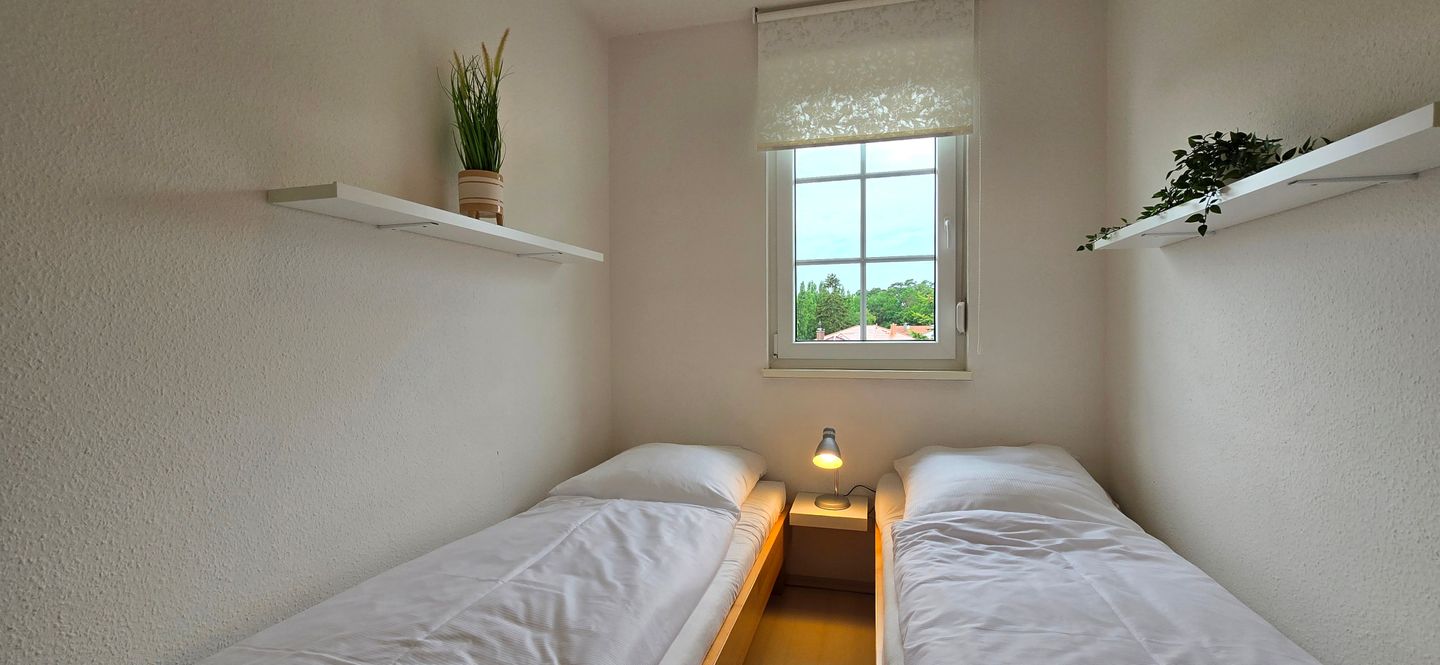  Ferienwohnung KK21 Graal-Müritz - Schlafzimmer
