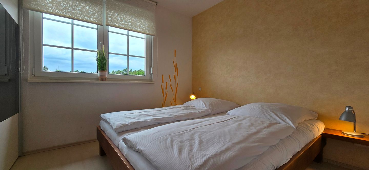  Ferienwohnung KK21 Graal-Müritz - Schlafzimmer