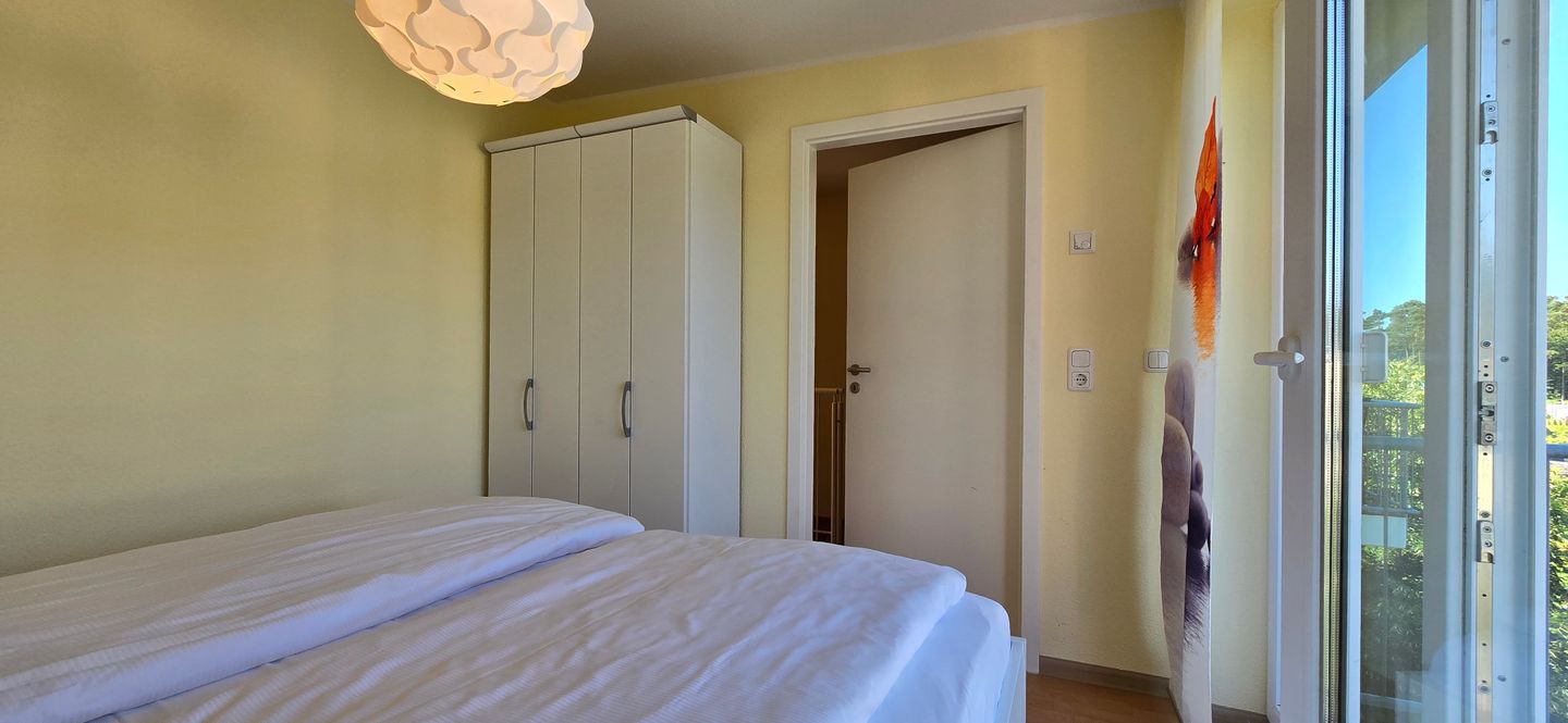  Ferienwohnung KWE 6 OG Graal-Müritz Küstenwald - Schlafzimmer
