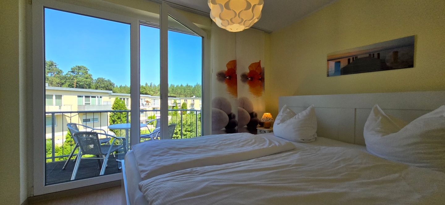  Ferienwohnung KWE 6 OG Graal-Müritz Küstenwald - Schlafzimmer