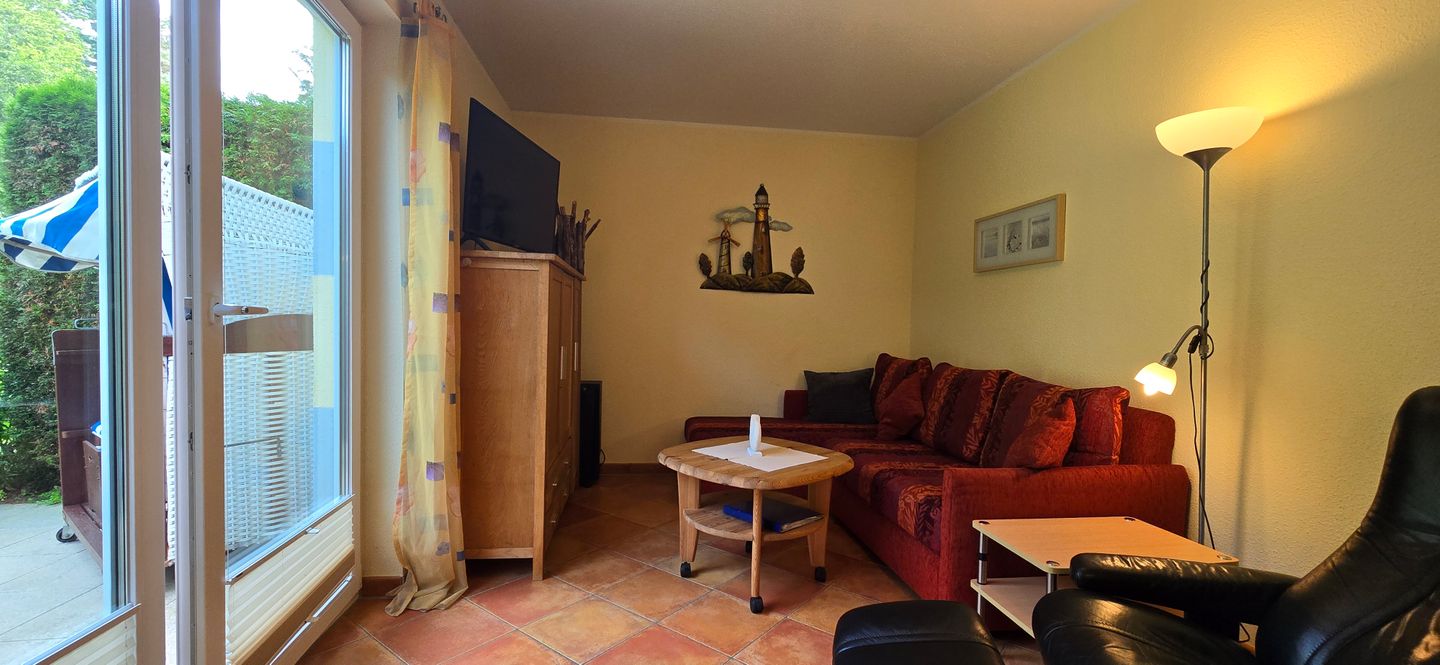  Ferienwohnung KWE 17EG Graal-Müritz Küstenwald - Wohnzimmer