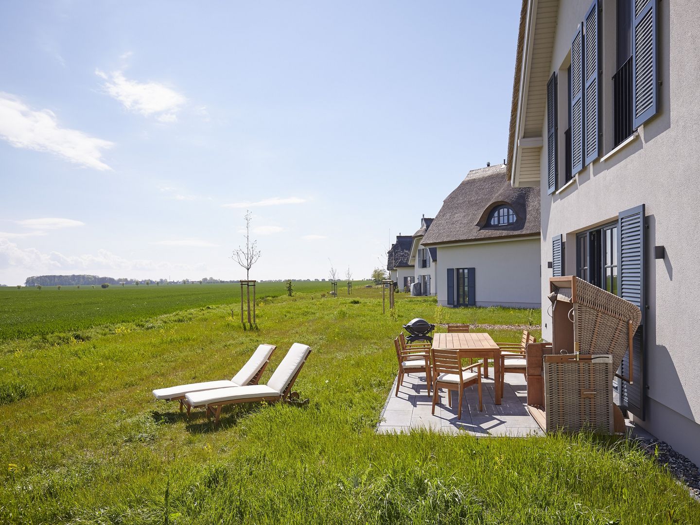 Luxus Reetdachvilla mit 3 Schlafzimmern, Sauna und Kamin (F11) - Terrasse