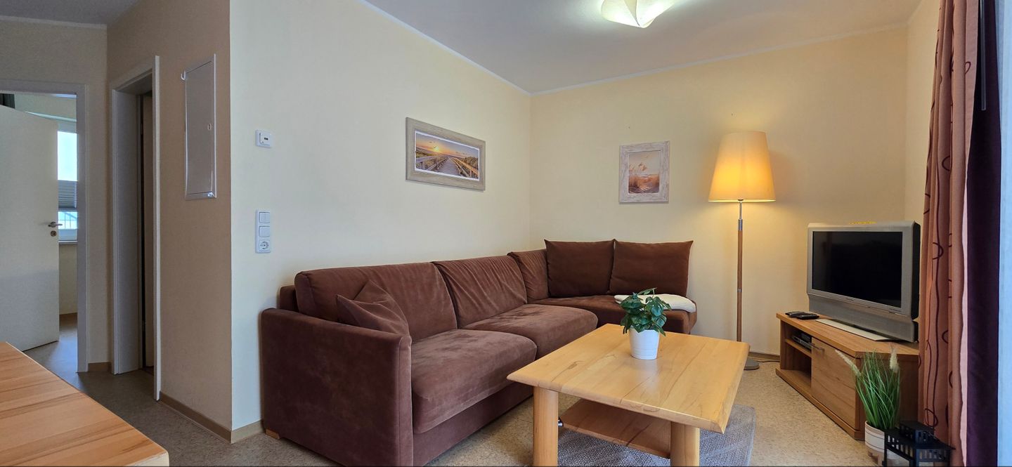  Ferienwohnung KWE 32EG Graal-Müritz Küstenwald - Wohnzimmer