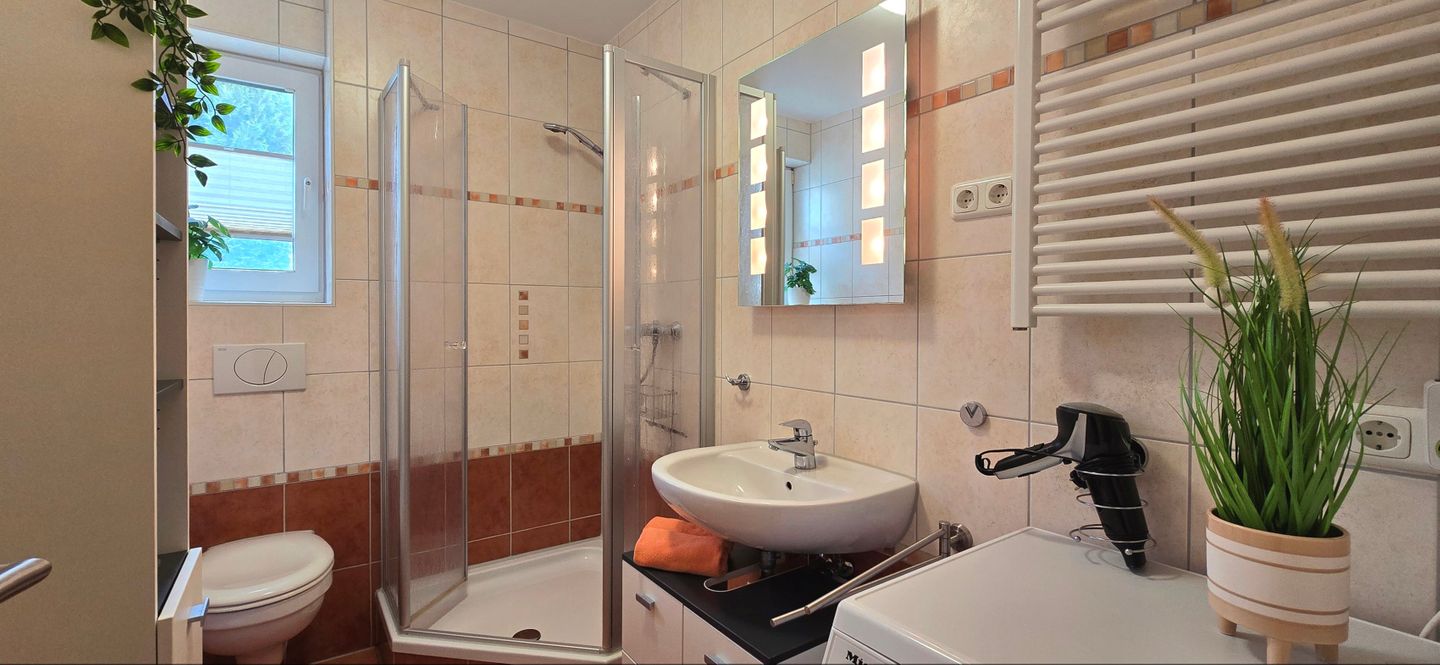  Ferienwohnung KWE 32EG Graal-Müritz Küstenwald - Badezimmer