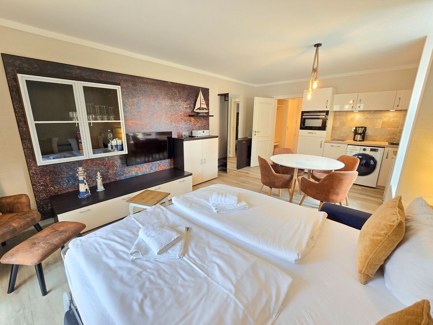 Feriendorf Rugana Komfortplus 1-Raum Ferienwohnung mit Terrasse (C47) Insel Rügen - Wohnzimmer