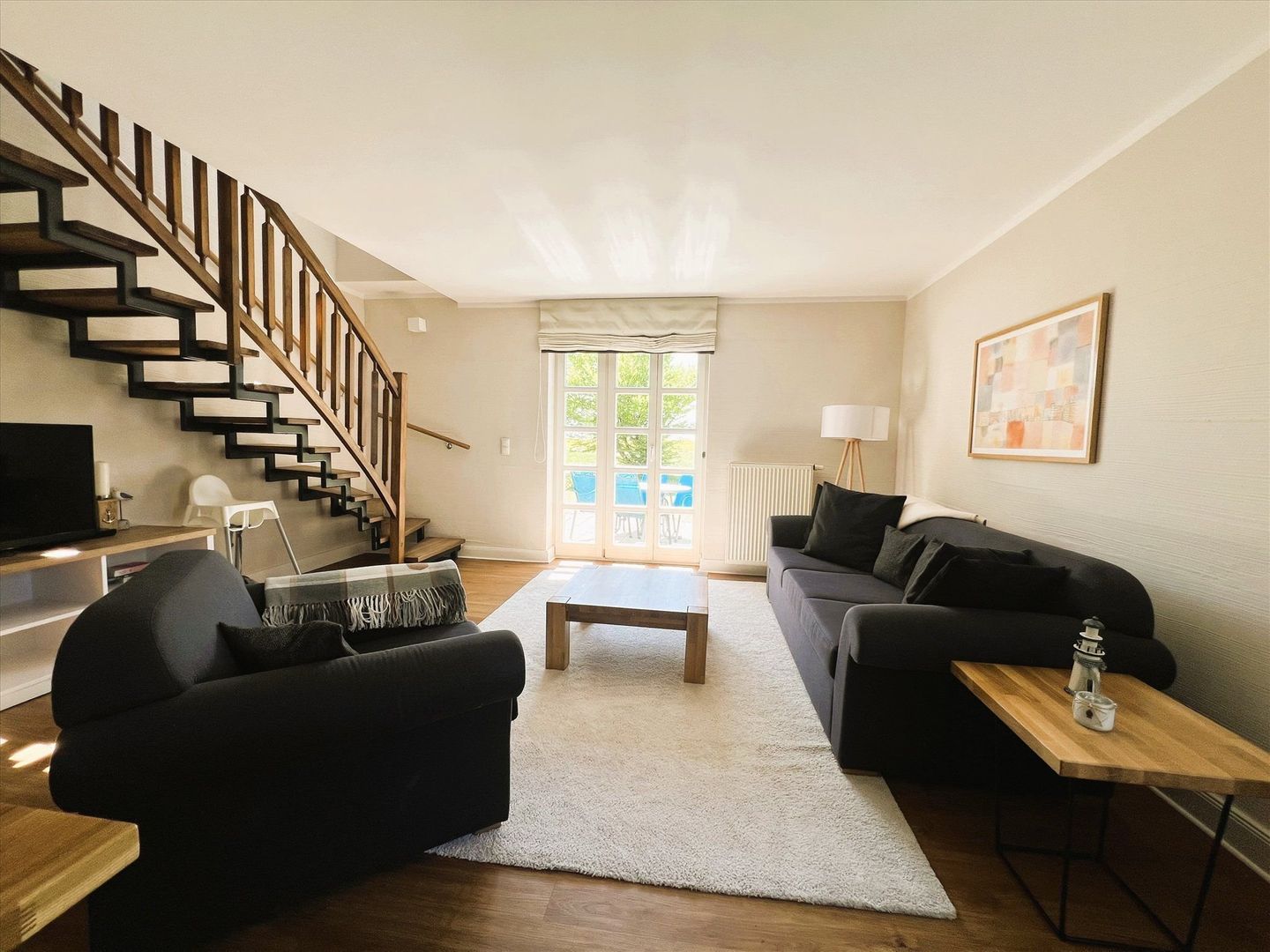 Feriendorf Rugana Komfortplus Ferienwohnung an der Feldkante mit 2 Schlafzimmern und Terrasse (D17) Insel Rügen - Wohnzimmer