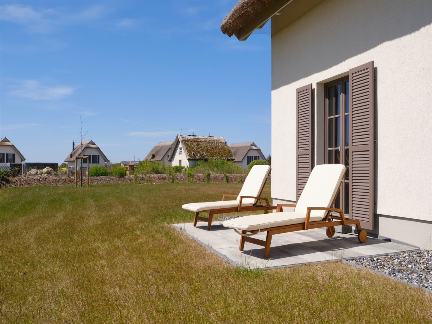 Luxus Reetdachvilla mit 3 Schlafzimmern, Sauna und Kamin (H20) - Terrasse