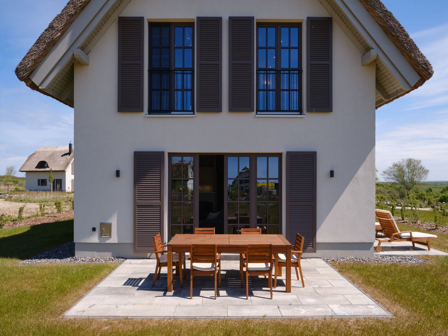 Luxus Reetdachvilla mit 3 Schlafzimmern, Sauna und Kamin (H20) - Terrasse