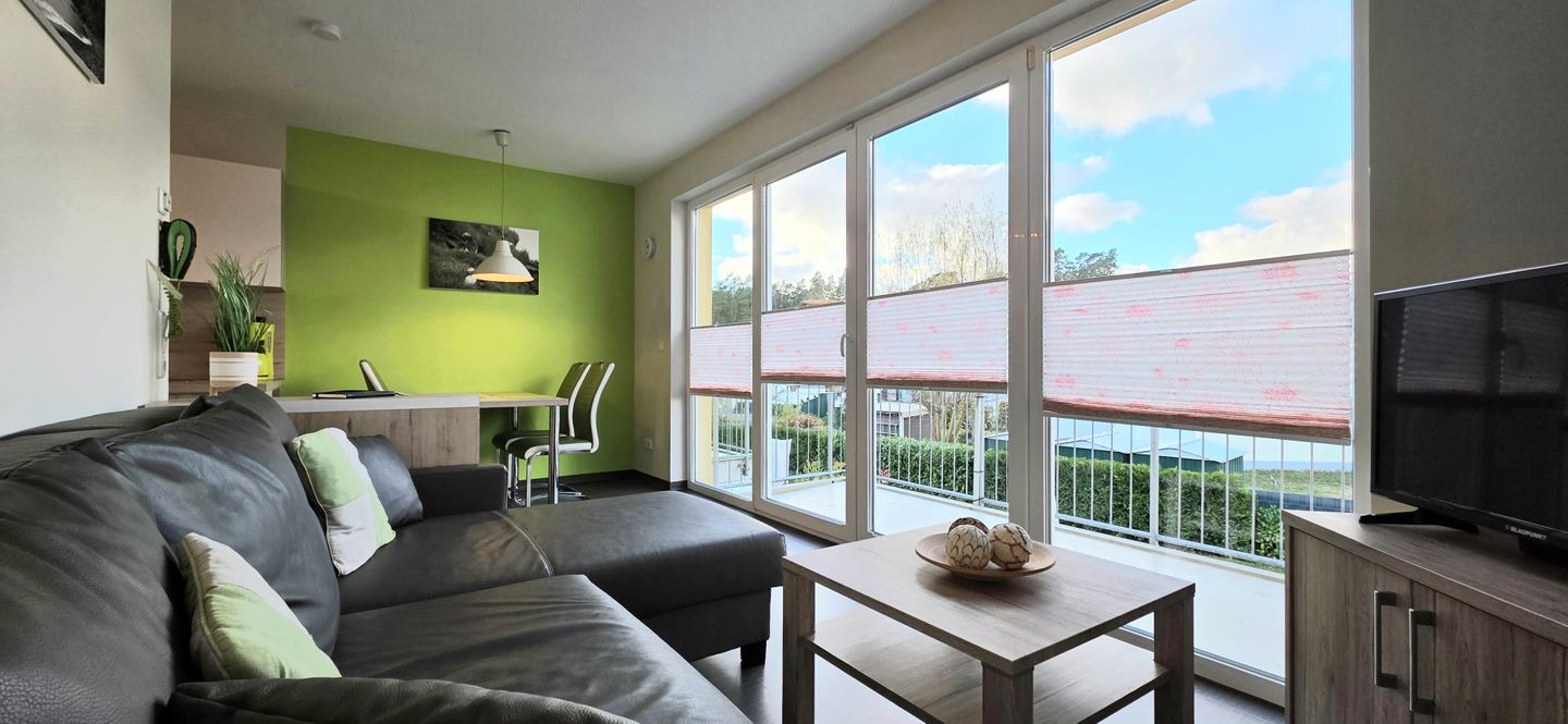  Ferienwohnung KWi 74 OG "Lundi" Graal-Müritz Küstenwald - Wohnzimmer