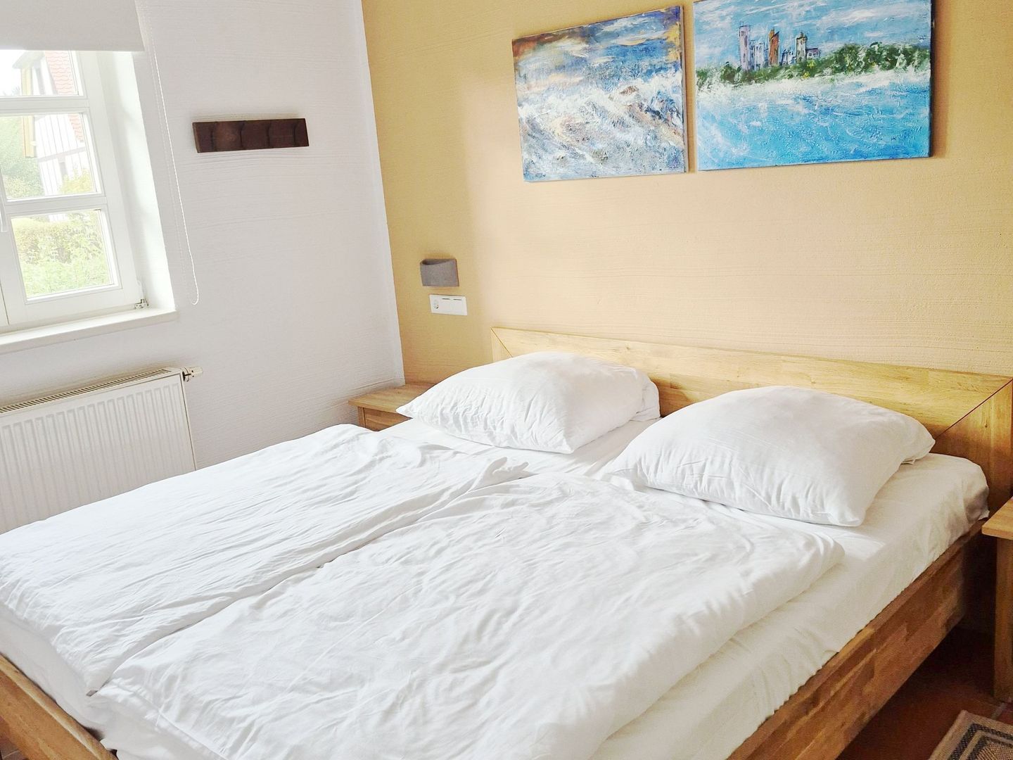 Feriendorf Rugana Komfortplus Ferienwohnung mit 1 Schlafzimmer und Terrasse (D25) Insel Rügen - Schlafzimmer