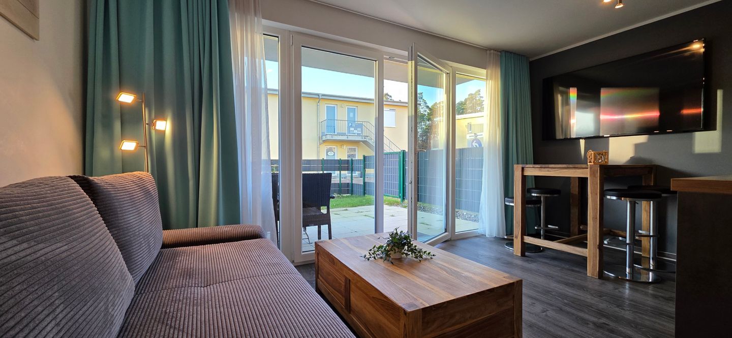  Ferienwohnung KWU 1 EG - "Casa Ostsee" Graal-Müritz Küstenwald - Wohnzimmer