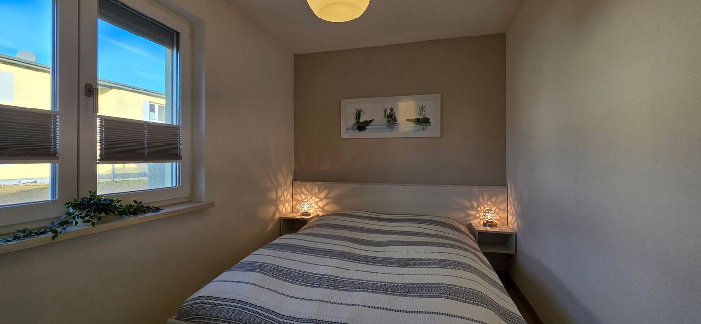  Ferienwohnung KWi 46 EG Graal-Müritz Küstenwald - Schlafzimmer