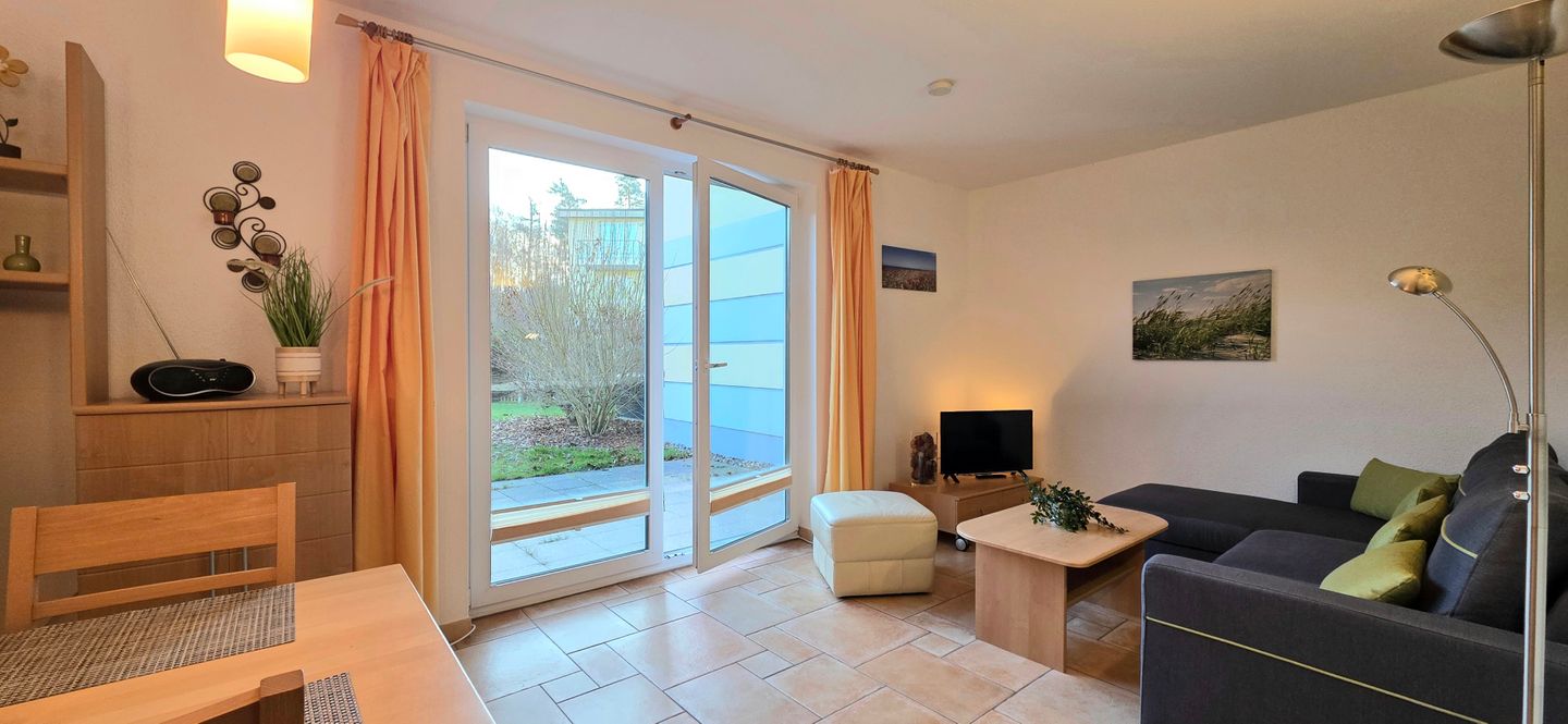  Ferienwohnung KWF6bEG Graal-Müritz Küstenwald - Wohnzimmer