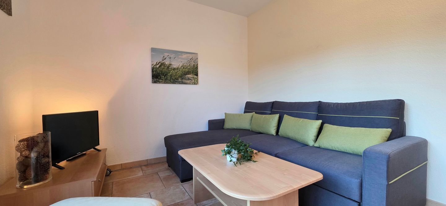  Ferienwohnung KWF6bEG Graal-Müritz Küstenwald - Wohnzimmer