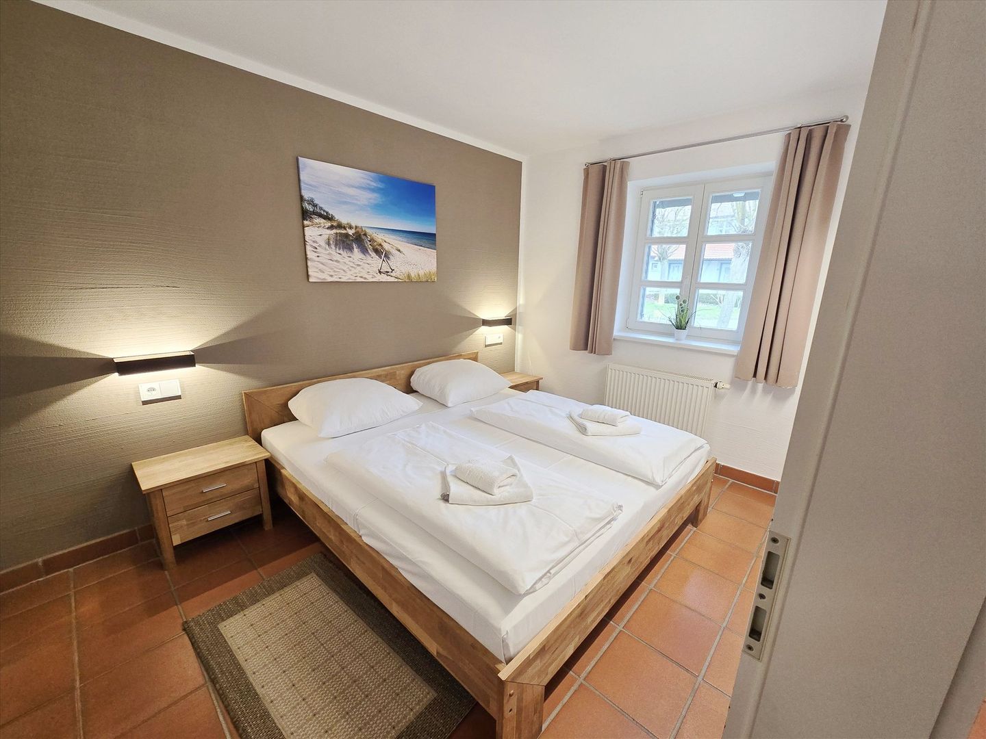 Feriendorf Rugana Komfortplus Ferienwohnung mit 1 Schlafzimmern und Terrasse Insel Rügen - Schlafzimmer