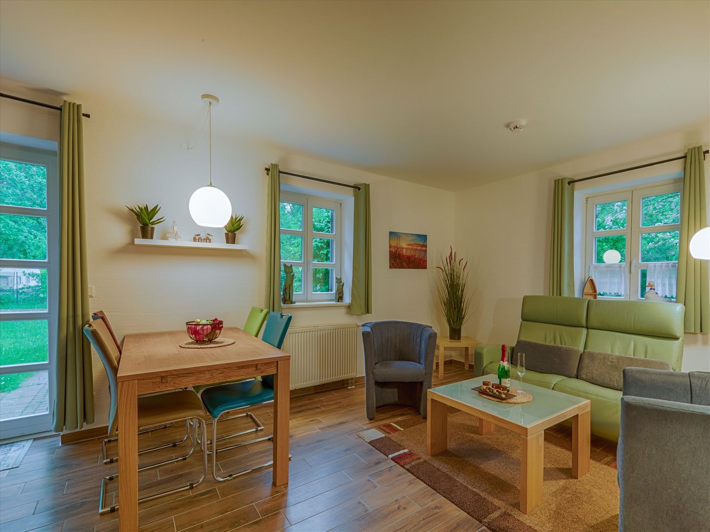 Feriendorf Rugana Komfortplus Ferienwohnung mit 1 Schlafzimmern und Terrasse (C39) Insel Rügen - Wohnzimmer