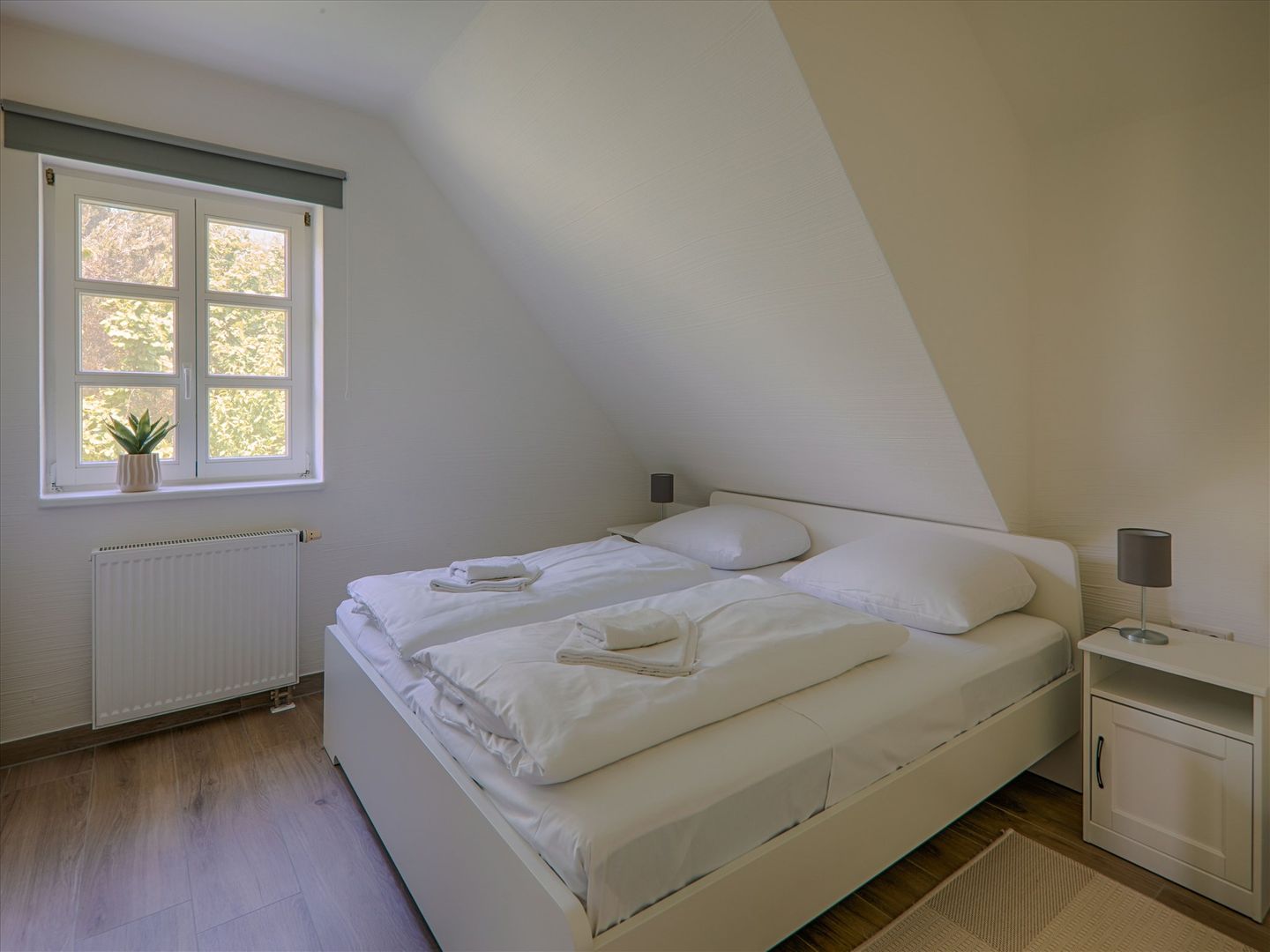 Feriendorf Rugana Komfortplus Ferienwohnung mit 1 Schlafzimmer (A22) Insel Rügen - Schlafzimmer