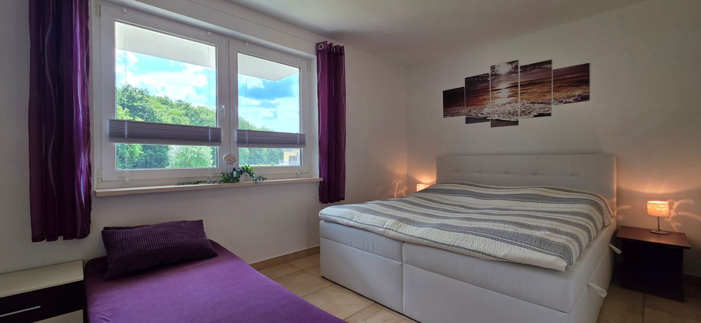  Ferienwohnung KWE 1 OG "MeerZeit" Graal-Müritz Küstenwald - Schlafzimmer