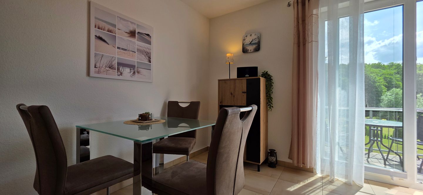  Ferienwohnung KWE 1 OG "MeerZeit" Graal-Müritz Küstenwald - Wohnzimmer