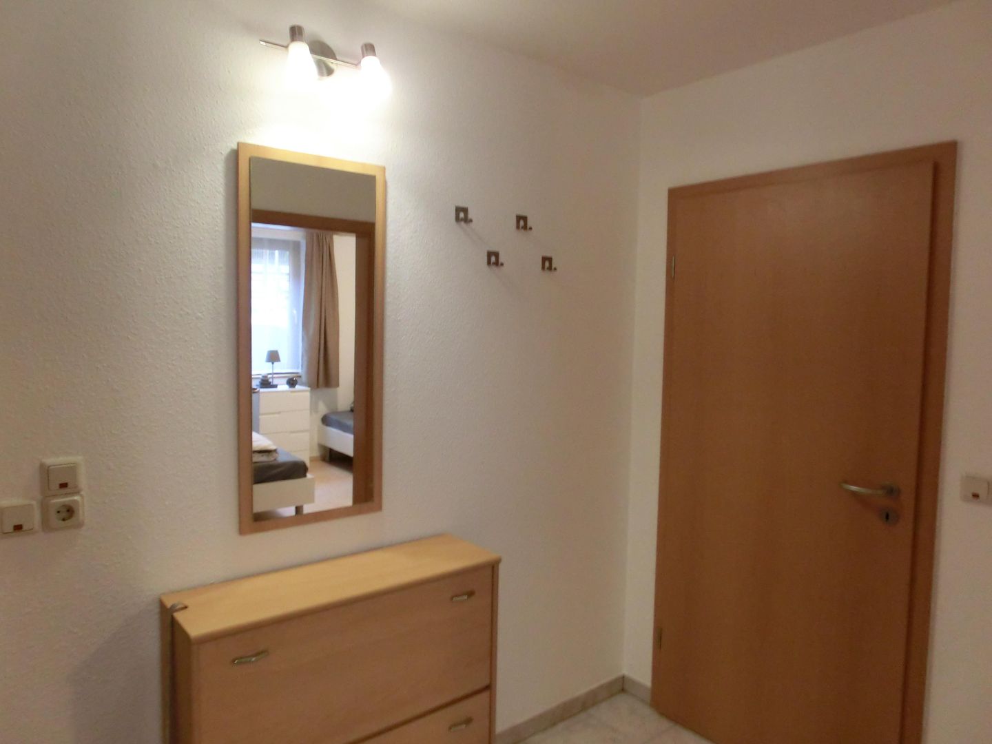  Ferienwohnung R22 Graal-Müritz - Fassade / Eingang