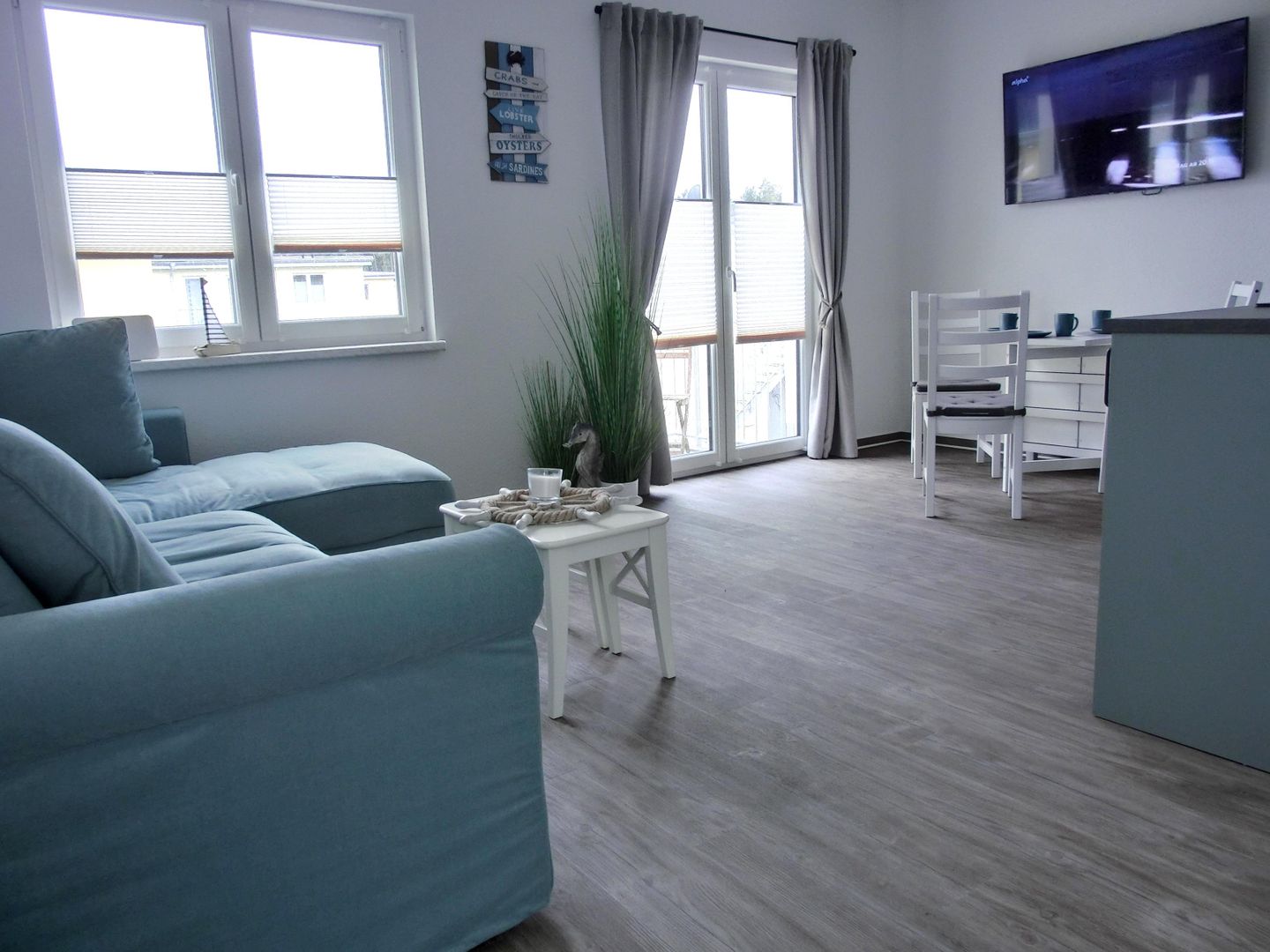  Ferienwohnung KWi5OG Graal-Müritz Küstenwald - Wohnzimmer