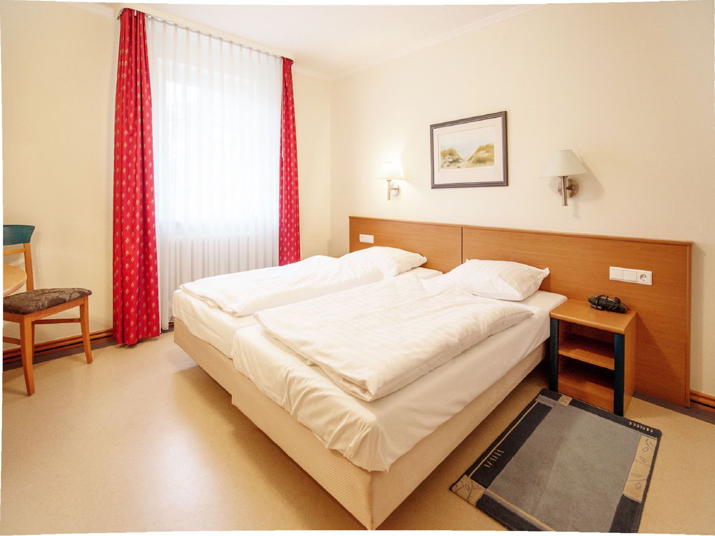 Dünenpark Binz Komfort Ferienwohnung mit 1 Schlafzimmer und Balkon im Obergeschoss (020) Insel Rügen - Schlafzimmer