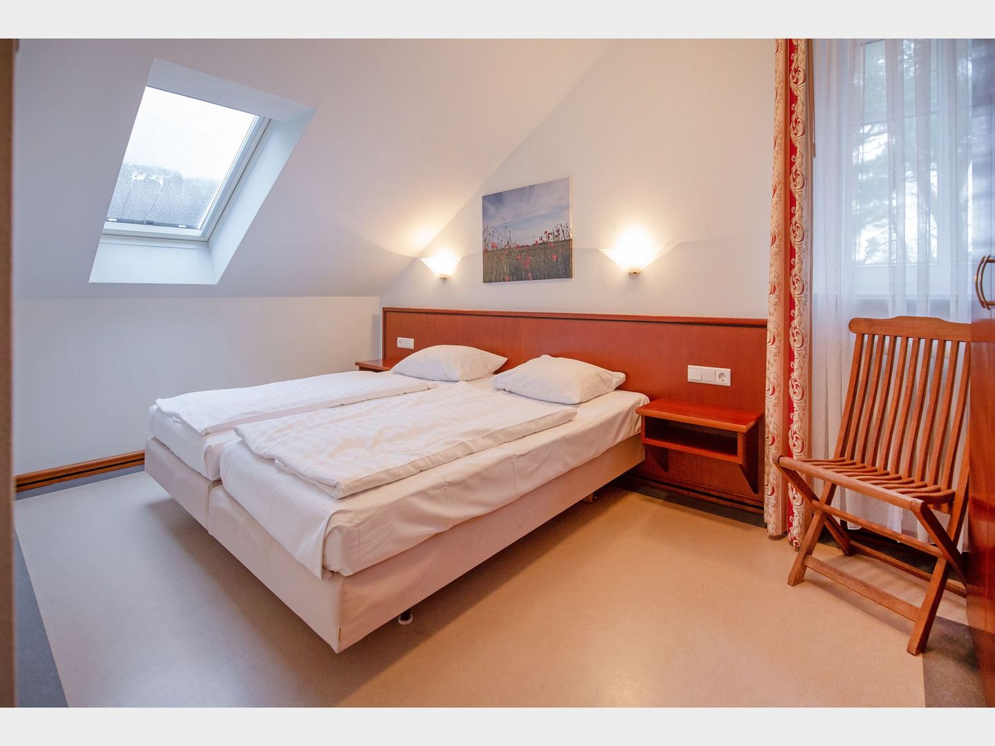 Dünenpark Binz Komfort Ferienwohnung mit 2 Schlafzimmern und Balkon im Dachgeschoss (031) Insel Rügen - Schlafzimmer