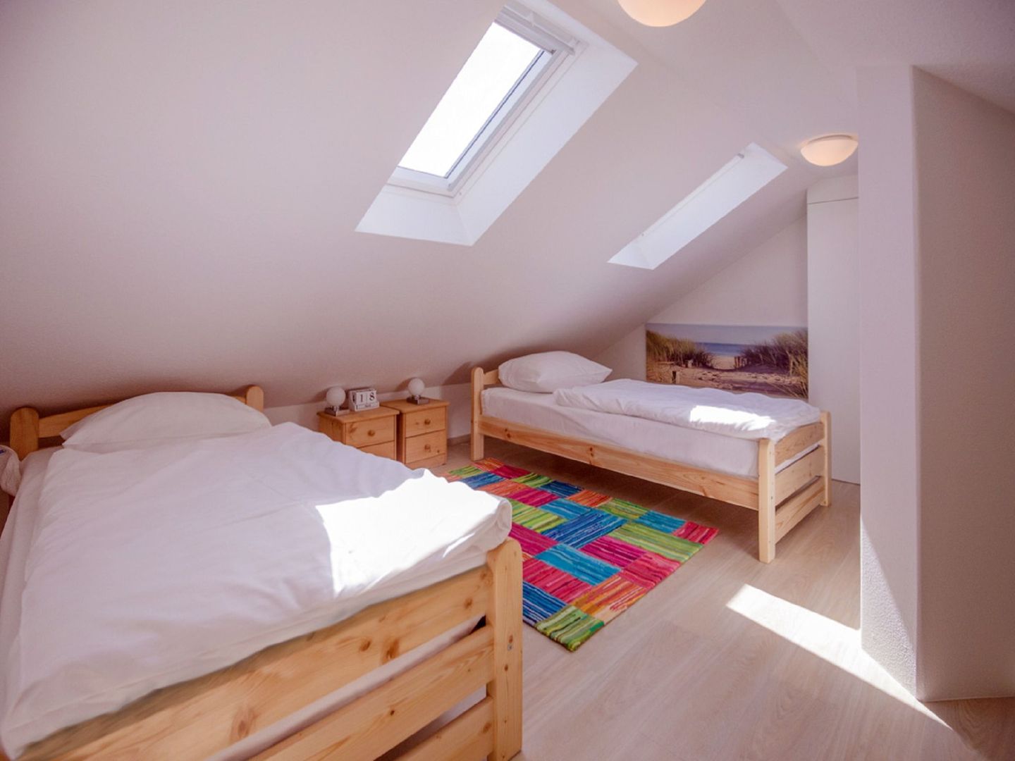 Dünenpark Binz Komfortplus Ferienwohnung mit 1 Schlafzimmer und Balkon im Dachgeschoss (113) Insel Rügen - Schlafzimmer