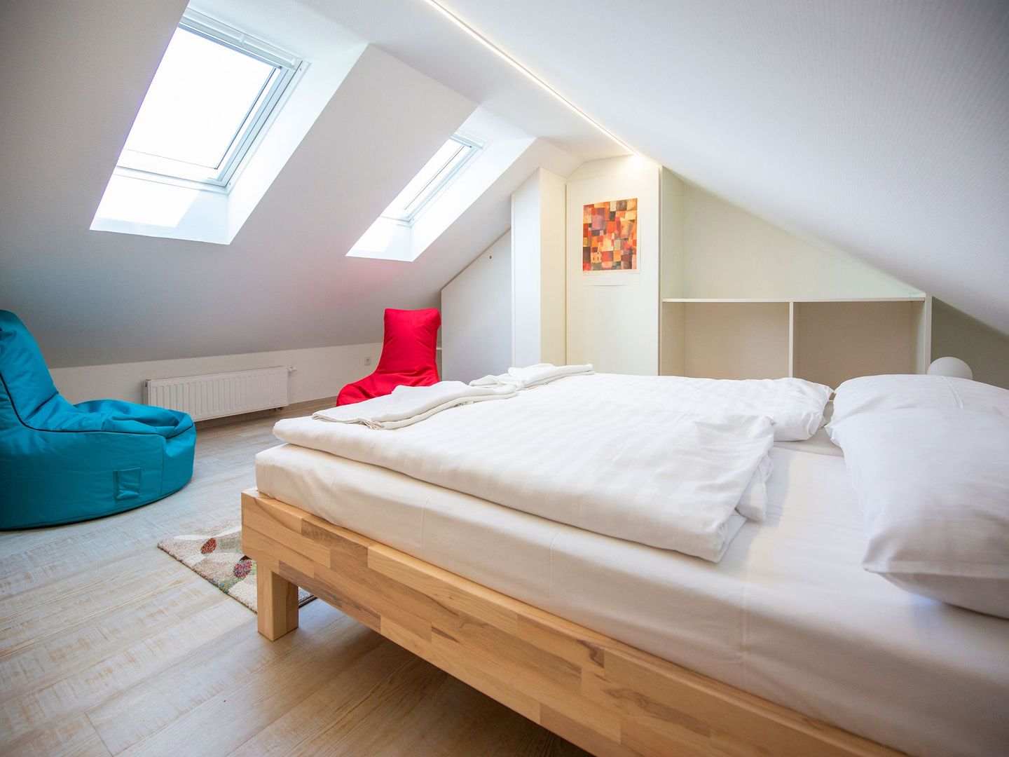 Dünenpark Binz Komfortplus Ferienwohnung mit 1 Schlafzimmer und Balkon im Dachgeschoss (114) Insel Rügen - Schlafzimmer