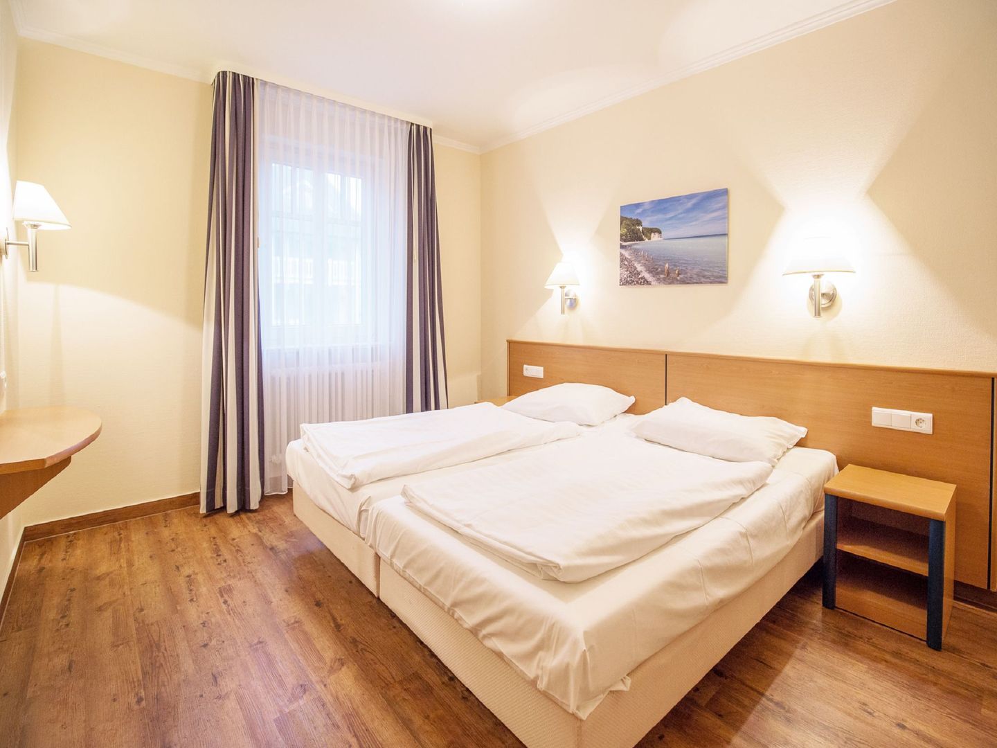 Dünenpark Binz Komfortplus Ferienwohnung mit 1 Schlafzimmer und Terrasse im Erdgeschoss (116) Insel Rügen - Schlafzimmer