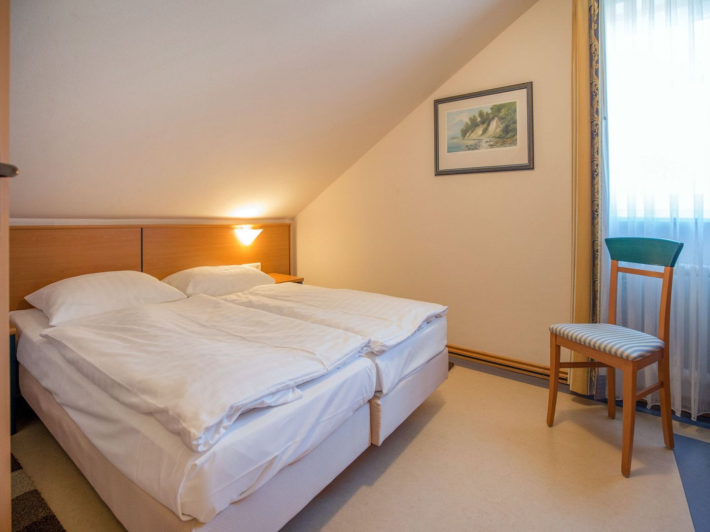 Dünenpark Binz Komfort Ferienwohnung mit 1 Schlafzimmer und Balkon im Dachgeschoss (186) Insel Rügen - Schlafzimmer