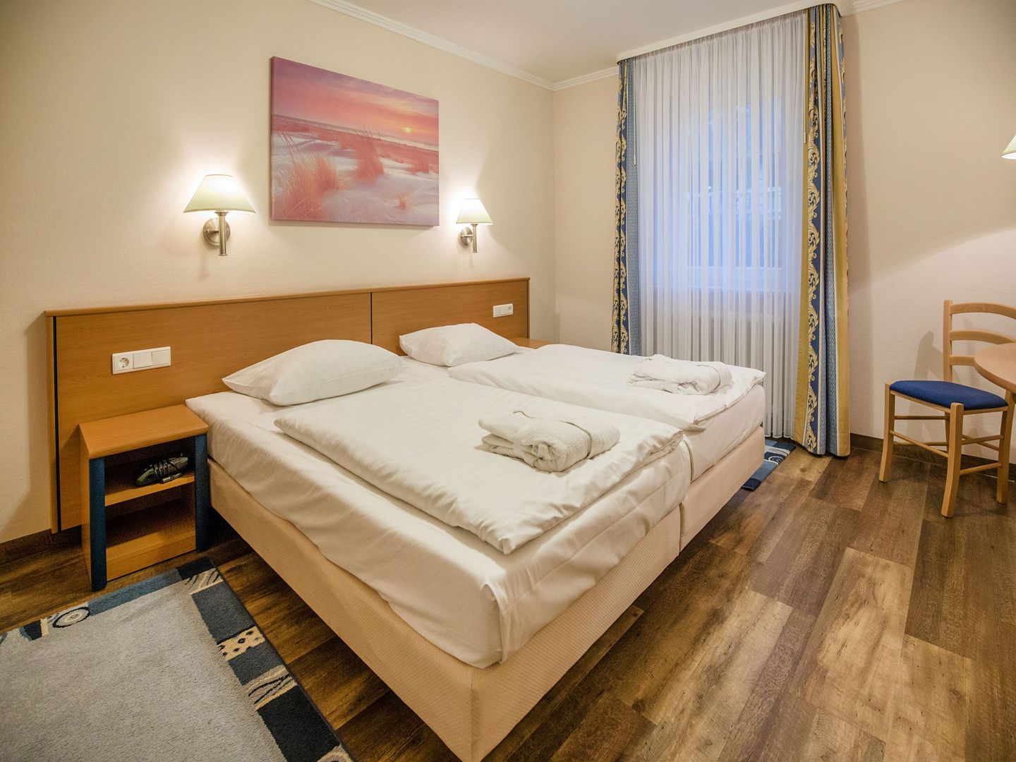 Dünenpark Binz Komfortplus Ferienwohnung mit 1 Schlafzimmer und Terrasse im Erdgeschoss (221) Insel Rügen - Schlafzimmer