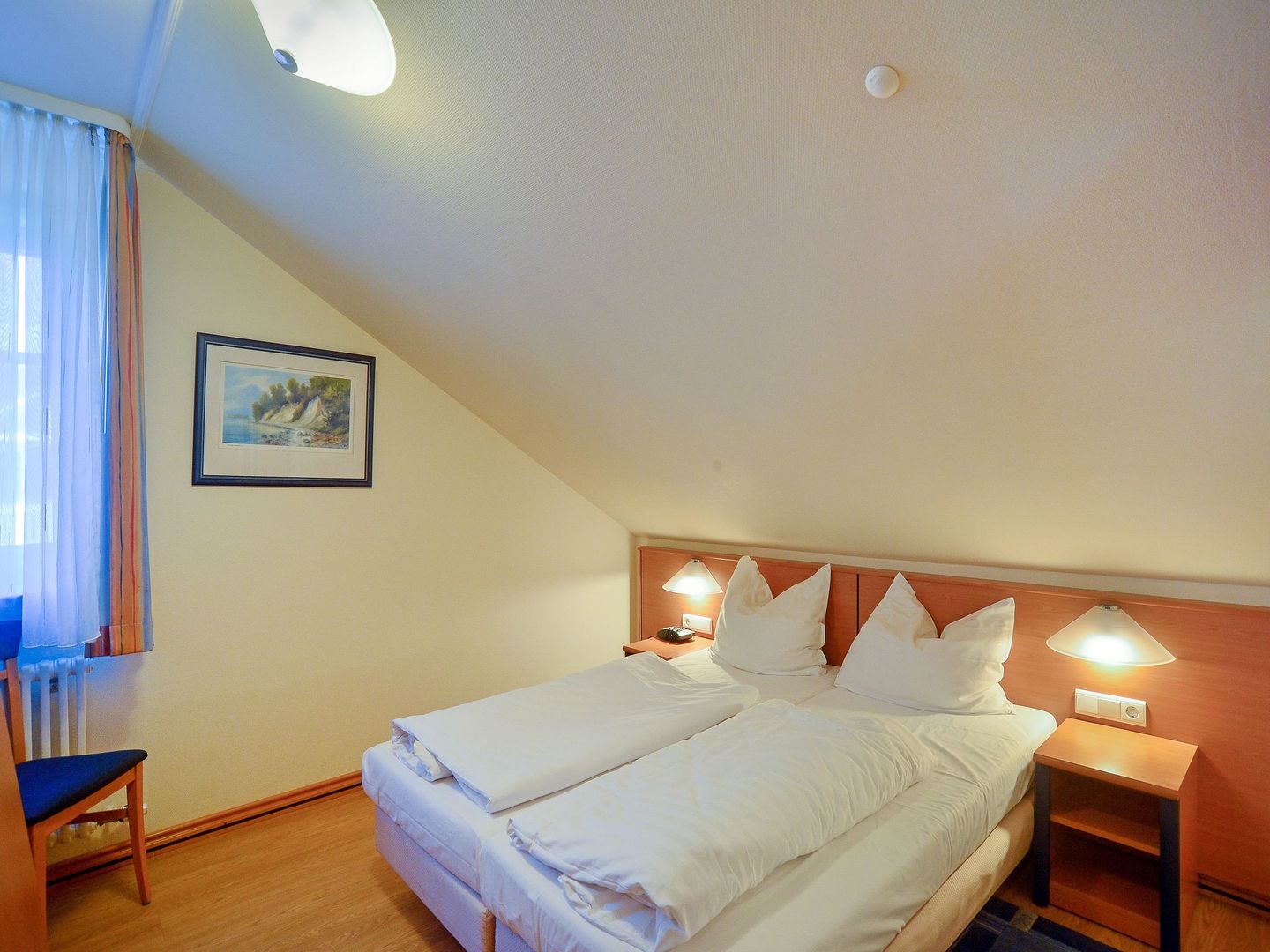 Dünenpark Binz Komfort Ferienwohnung mit 1 Schlafzimmer und Balkon im Dachgeschoss (293) Insel Rügen - Schlafzimmer