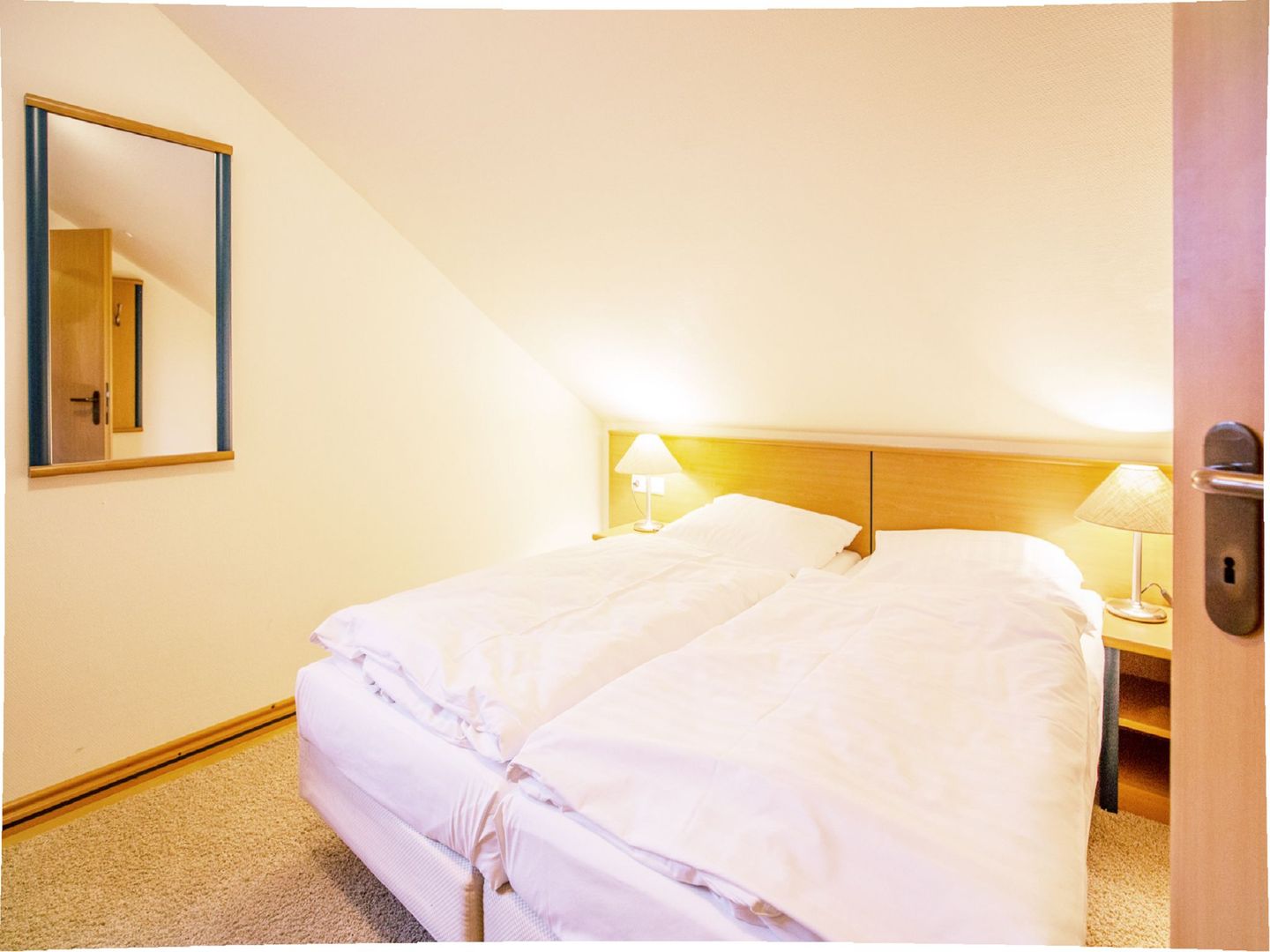 Dünenpark Binz Komfortplus Ferienwohnung mit 1 Schlafzimmern und Balkon im Dachgeschoss (303) Insel Rügen - Schlafzimmer