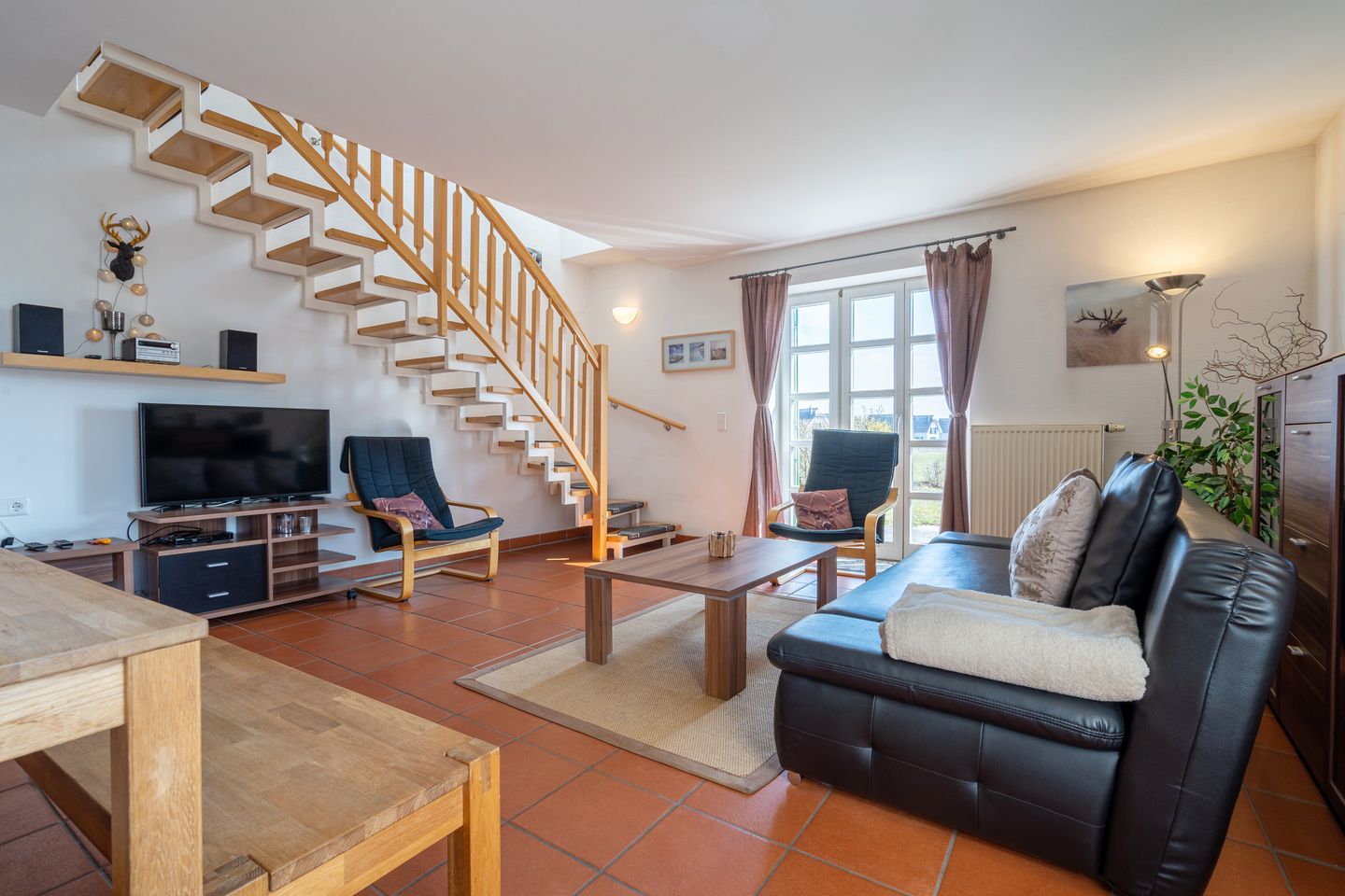 Feriendorf Rugana Komfort Ferienwohnung mit 2 Schlafzimmern und Terrasse (B01) Insel Rügen - Wohnzimmer