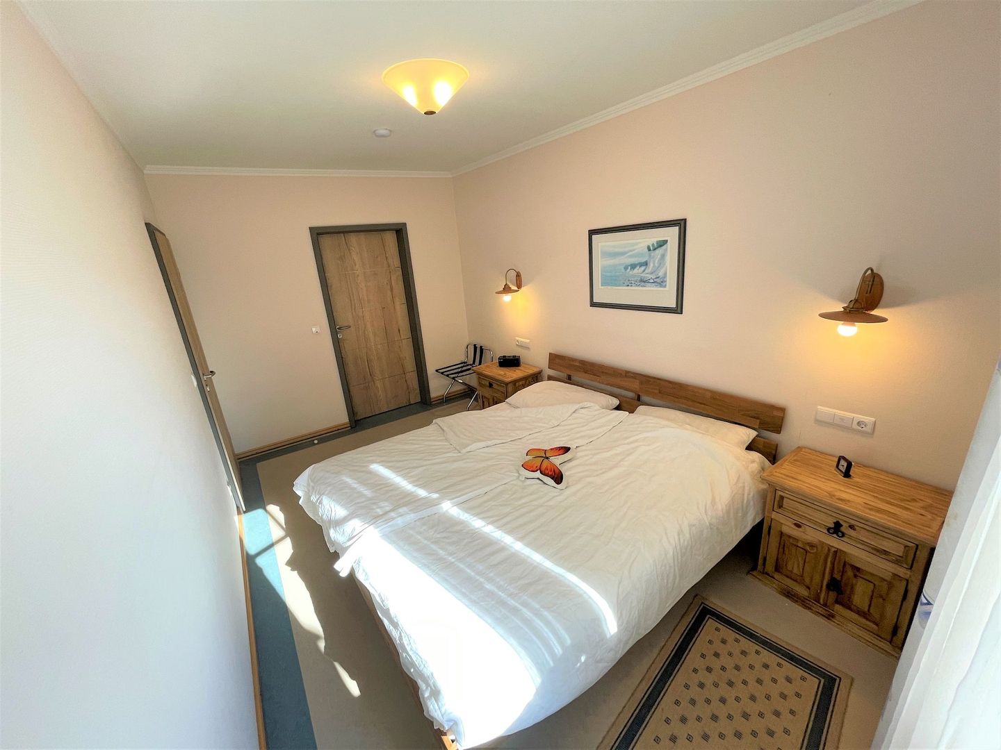 Dünenpark Binz Komfortplus Ferienwohnung mit 1 Schlafzimmer und Balkon im Obergeschoss (168) Insel Rügen - Schlafzimmer