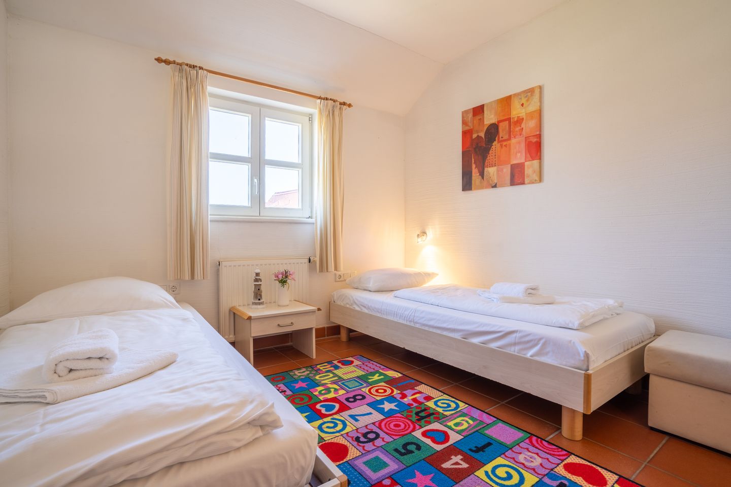 Feriendorf Rugana Klassik Ferienwohnung mit 2 Schlafzimmern und Terrasse (C50) Insel Rügen - Schlafzimmer
